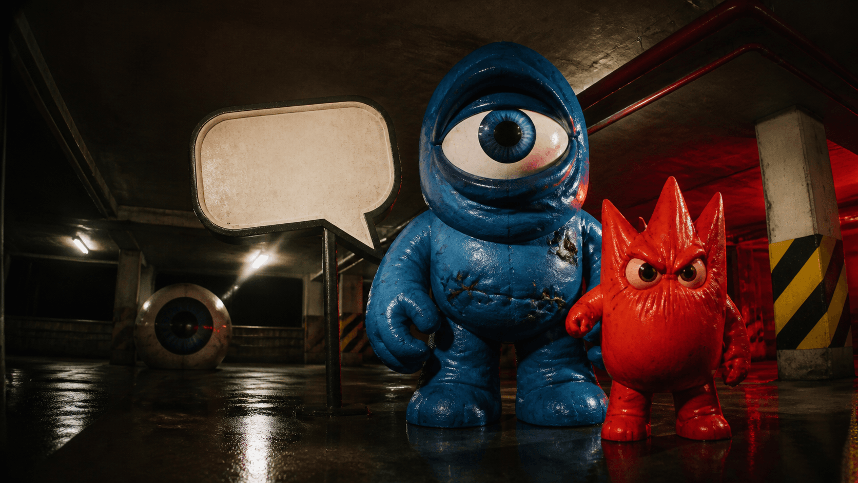 MUNI, a large blue one-eyed mascot, and SIRENS, a smaller red two-eyed mascot, stand in a parking garage beside a speech-bubble sign.